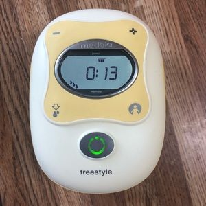 Medela freestyle pump with extras